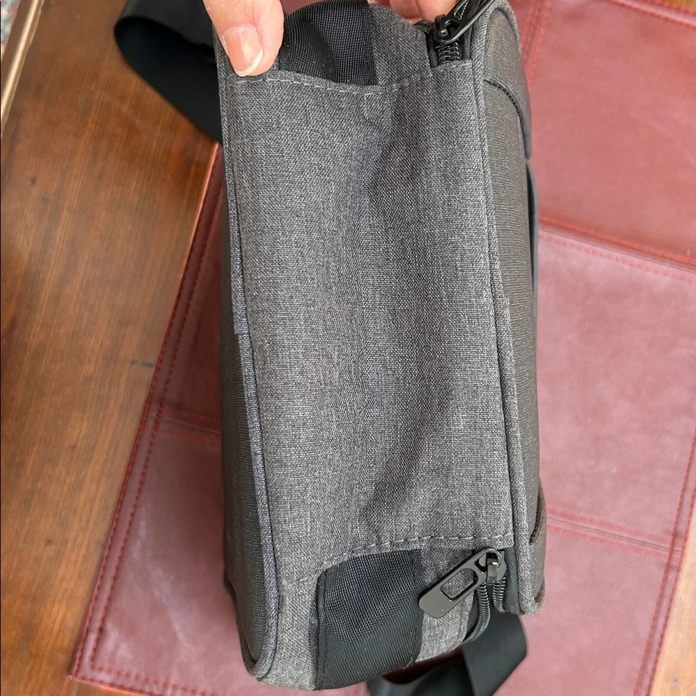 EXO Padded Men's Black Crossbody Bag. Protection for what you carry. 11x8.5”.
